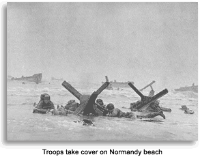 Troops take cover on Omaha Beach